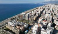 AL-757-5, Am Strand gelegene, seniorenfreundliche Eigentumswohnung (5 Zimmer, 3 Bäder) mit Ausblick auf das Mittelmeer in Alanya-Mahmutlar