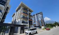 AL-930-1, Neubau-2-Zimmer-Wohnung mit Terrasse und Pool in Alanya Mahmutlar
