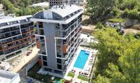 AL-1464, Fernblick-Eigentumswohnung mit Wellnessbereich und Terrasse in Alanya-Avsallar