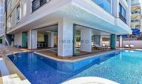 AL-1780, 1+1-Wohnung (53 m²) mit teilweisem Meerblick im Zentrum von Alanya – Innen- und Außenpools, Sauna und Fitnessbereich