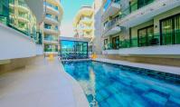 AL-1781, Brandneue 1+1-Wohnung (55 m²) in einer Wohnanlage aus dem Jahr 2025, 100 m vom Meer entfernt im Zentrum von Alanya – VIP-Spa, Hallenbad und Fitnessbereich
