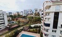 AL-1884, Blick auf die Berge von einer möblierten 65 m² großen 1+1-Wohnung in Avsallar – Balkon, Gemeinschaftspool, 800 m bis zum Strand