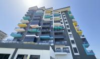AL-1888, Meer- und Stadtblick aus einer 2023 erbauten 1+1-Wohnung (50 m²) in Avsallar – Pool mit Wasserrutschen und Fitnessraum