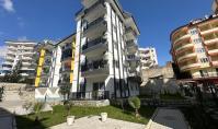AL-1889, Bezugsfertige 55 m² große 1+1-Wohnung in einer Wohnanlage in Avsallar aus dem Jahr 2022 – mit Pool, Sauna und Fitnessraum, 500 m vom Strand entfernt