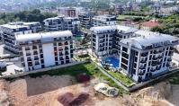 AL-1960, Balkon mit Blick auf den Pool und die Berge – Möblierte 50 m² große 1+1-Wohnung in einer Ferienanlage mit Kino und Hamam, Oba