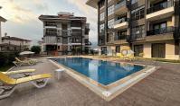 AL-1965, Brandneue 50 m² große 1+1-Wohnung neben einem begrünten Innenhof mit Pool – Sauna, Dampfbad und Fitnessraum in einer bewachten Wohnanlage in Oba