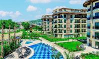 AL-1989, Innenausstattung aus Marmor und Blick auf den Pool – Möblierte 50 m² große 1+1-Wohnung mit amerikanischer Küche, 2. Etage, Oba