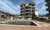 AL-2000, Neubau 2024 mit Pool und Sauna – 90 m² große 2+1-Wohnung im Erdgeschoss mit Marmorböden und Aufzug, 1,5 km vom Meer entfernt, Oba