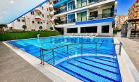 AL-2144, Privater Hamam-, Sauna- und Poolkomplex direkt am Strand – möblierte 90 m² große 2+1-Wohnung, mit Anspruch auf Aufenthaltsgenehmigung, Mahmutlar