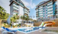 AL-2177, Wasserpark und Hallenbad: Möblierte 65 m² große 1+1-Wohnung in Kargıcak, 350 m vom Meer entfernt – Sauna und Fitnessraum