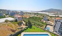 AL-2175, Blick auf das Meer und den Pool aus dem achten Stock – Vollständig möblierte 55 m² große 1+1-Wohnung mit Hamam, Sauna und Heimkino, Demirtaş