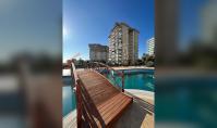 AL-2185, Meer- und Bergblick aus dem 8. Stock – 110 m² große 2+1-Wohnung mit Pool, Wasserrutsche, Hamam und Fitnessraum, Çıkcılli