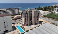 AL-2212, 50 m vom Meer entfernt – Maisonette-Wohnung im obersten Stockwerk, 100 m², 2+1, mit Balkonen mit Meerblick, Pool, Sauna und Dampfbad, Kargicak