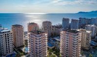 AL-2259, Meerblick aus einer möblierten 125 m² großen 2+1-Wohnung mit zwei großen Balkonen in einem Komplex mit Sauna und Fitnessraum, Mahmutlar