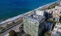 AL-2313, Turm direkt am Strand mit Aquapark und weitem Meerblick: Möblierte 65 m² große 1+1-Wohnung im 1. Stock, Mahmutlar