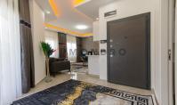 AL-2379, Von einem Designer eingerichtete 50 m² große 1+1-Wohnung im 1. Stock mit Pool und Fitnessraum, 1 km vom Meer entfernt, Mahmutlar