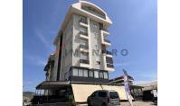AL-2388, 2024 erbaut, möblierte 50 m² große 1+1-Wohnung mit Pool, Fitnessraum und Sauna, 450 m vom Meer entfernt – Kargicak
