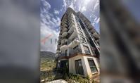 AL-2401, Hallenbad-, Sauna- und Hamam-Anlage: 50 m² große 1+1-Wohnung im 3. Stock mit Blick ins Grüne, Mahmutlar