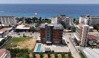 AL-2427, Brandneue 50 m² große 1+1-Wohnung, 100 m vom Meer entfernt, in einer 2024 errichteten Wohnanlage mit Pool, Sauna und Fitnessraum, Kargicak